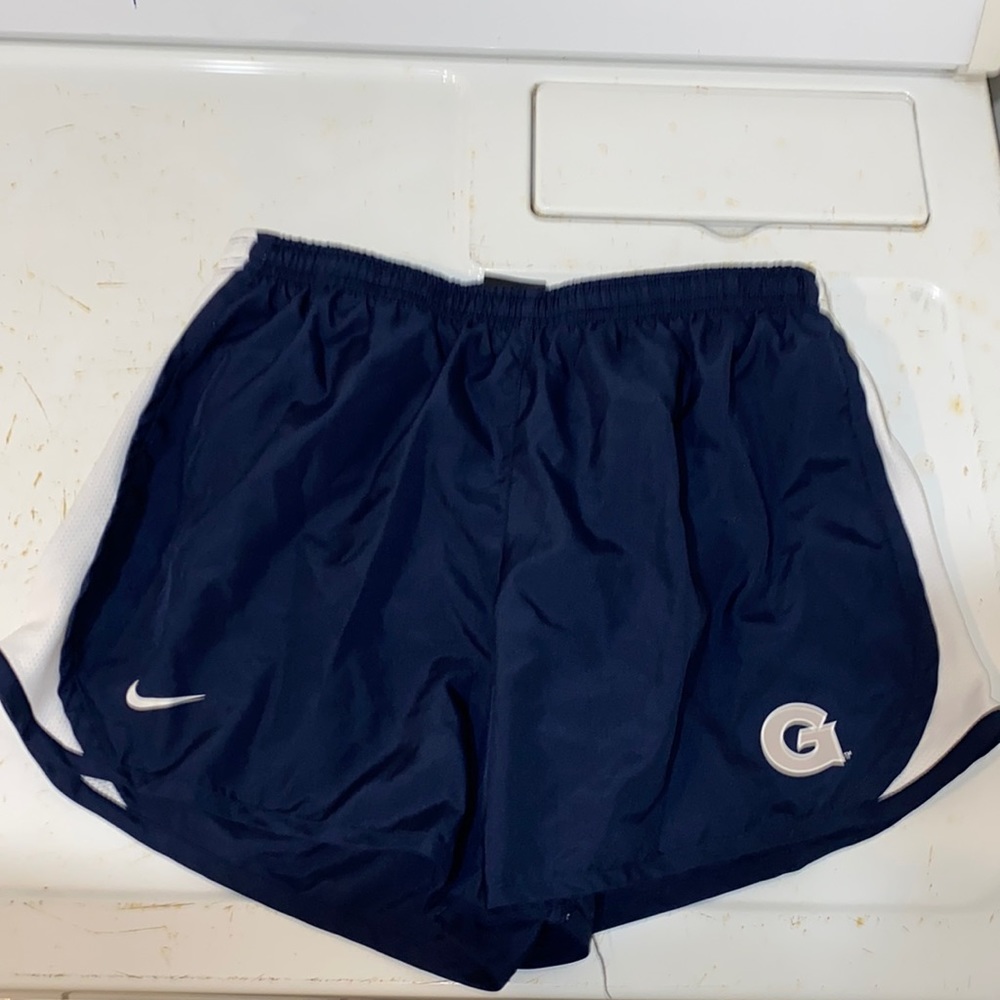 Nike dri-fit running shorts with Georgetown university logo